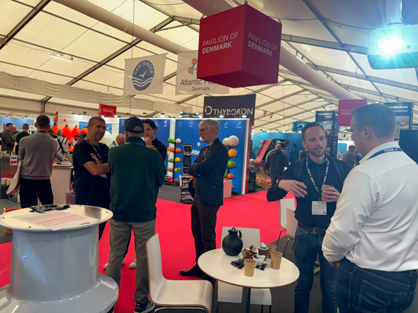 Atmospheric photo from DanFish 2025 – lively discussions and activity at AS SCAN’s stand.