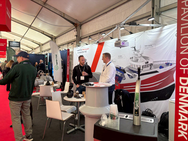 Customers and partners talking with the AS SCAN team at DanFish 2025.